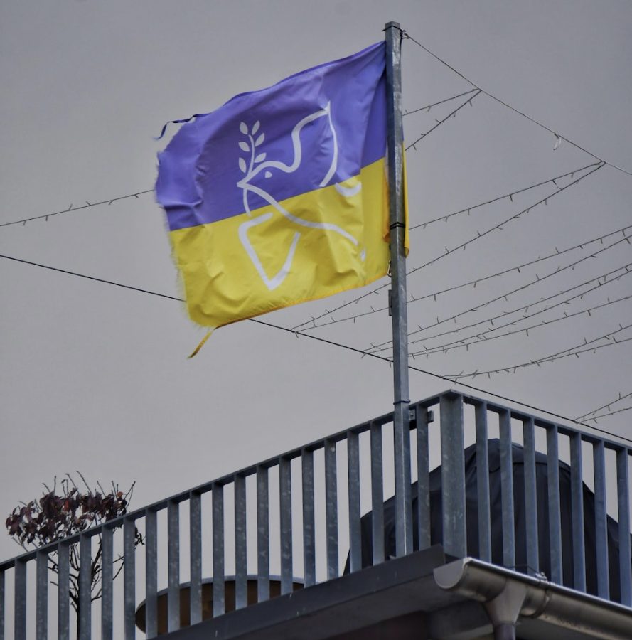 A Ukrainian peace flag waves in the wind.