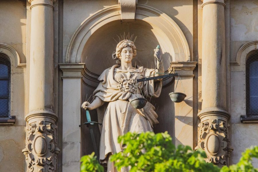Statue of woman holding scales of justice