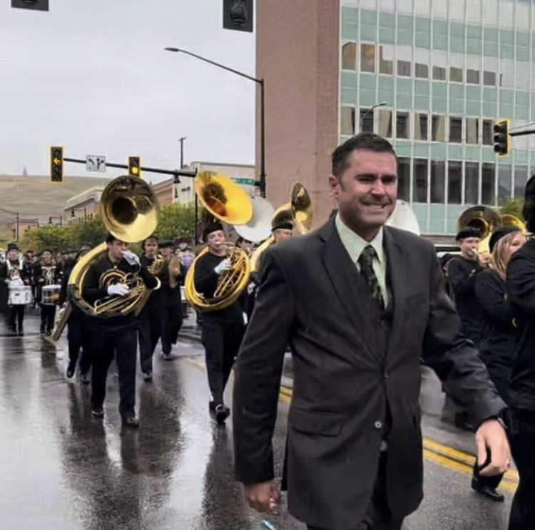 Mr. Nelson leading the Sentinel Marching Band in the 2023 UM Homecoming parade.