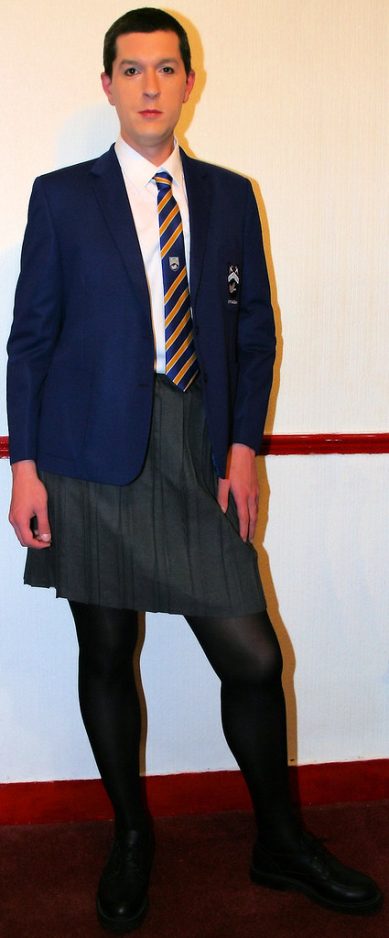 Person standing in school uniform