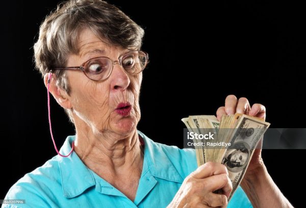 Old woman counting her racks