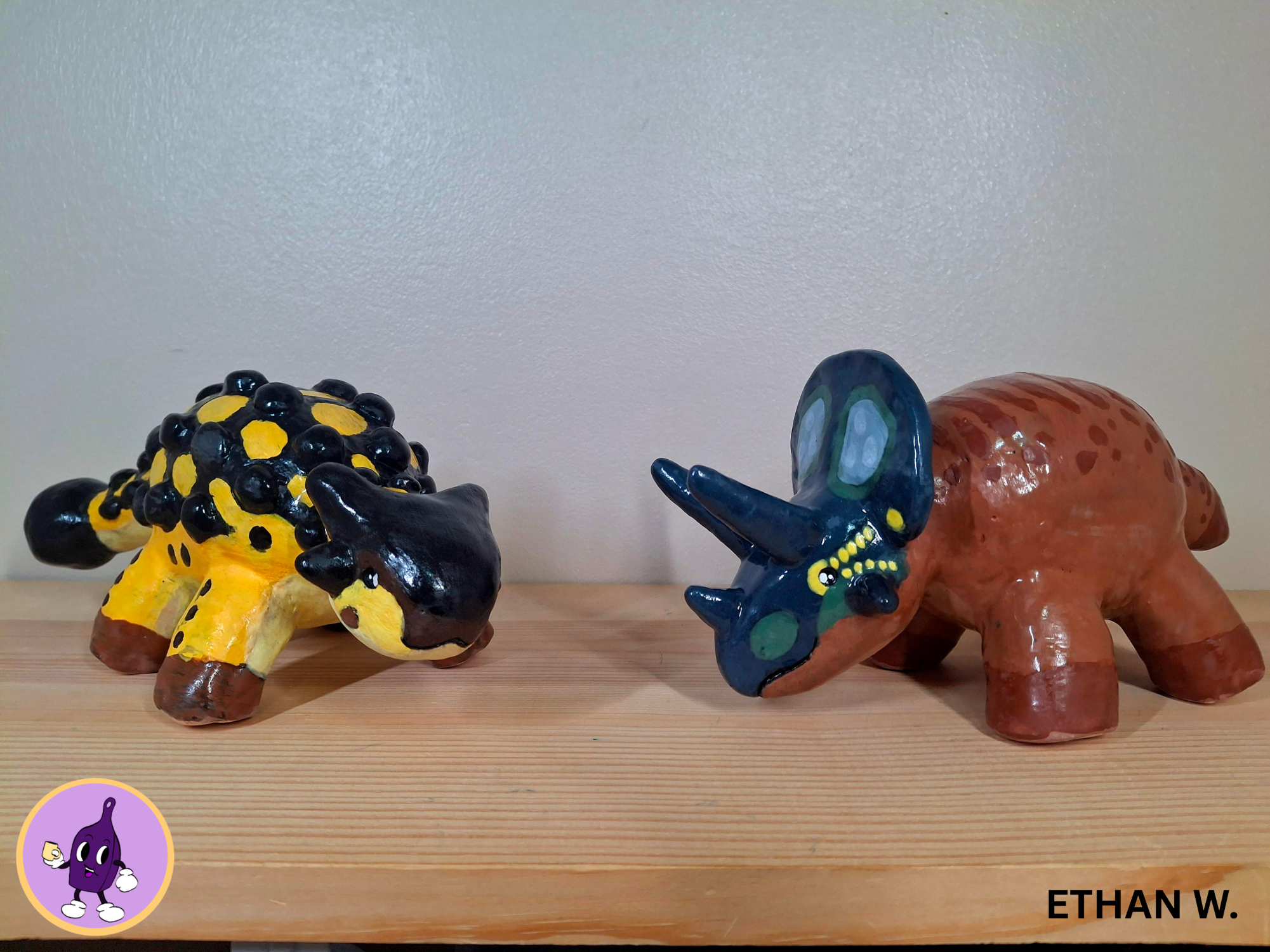 The clay dinosaur survived the kiln. It has a friend now. Their names are Anky Bee and Cera Blue.
