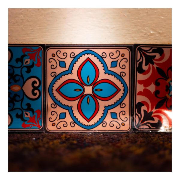 A slightly bent wall tile with a flower pattern