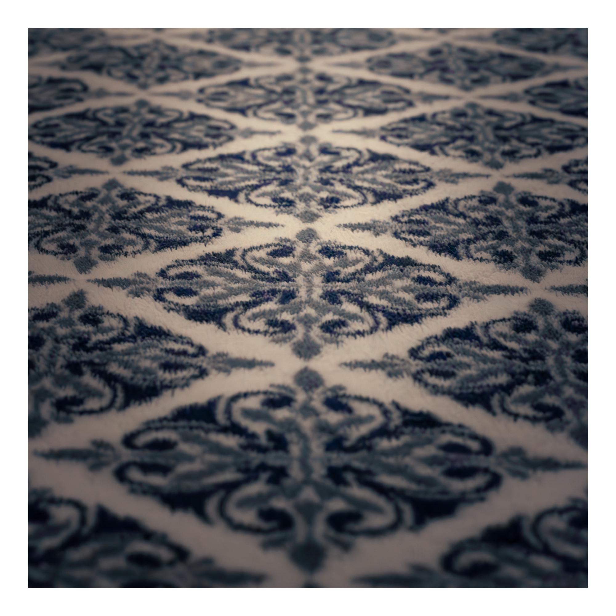 A blanket lying with a repeating pattern