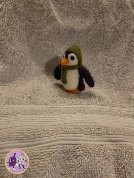 Miniature penguin in the snow